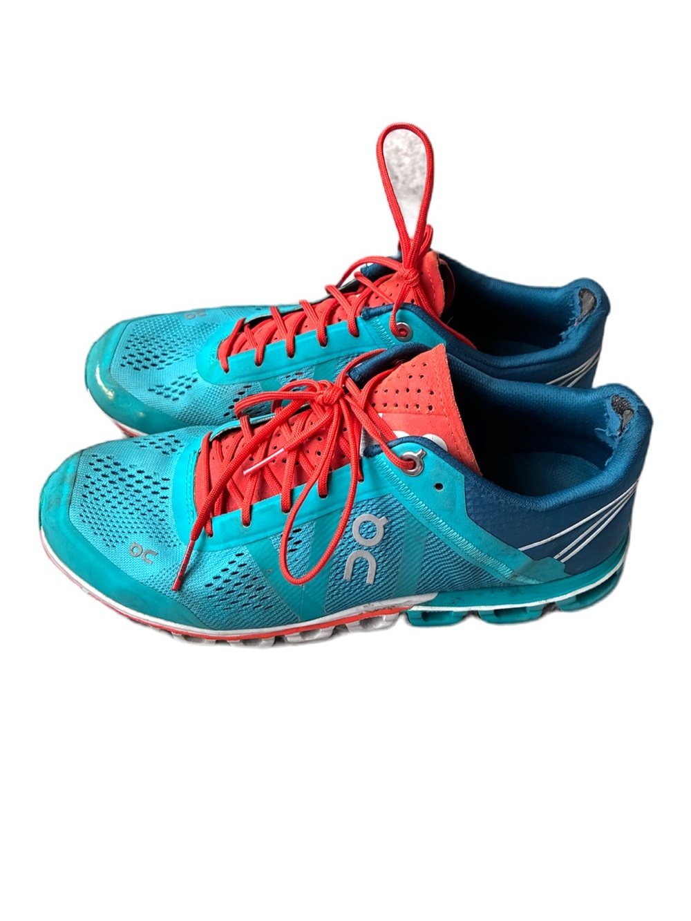 Women’s On Cloud. Teal and orange. Size 7.